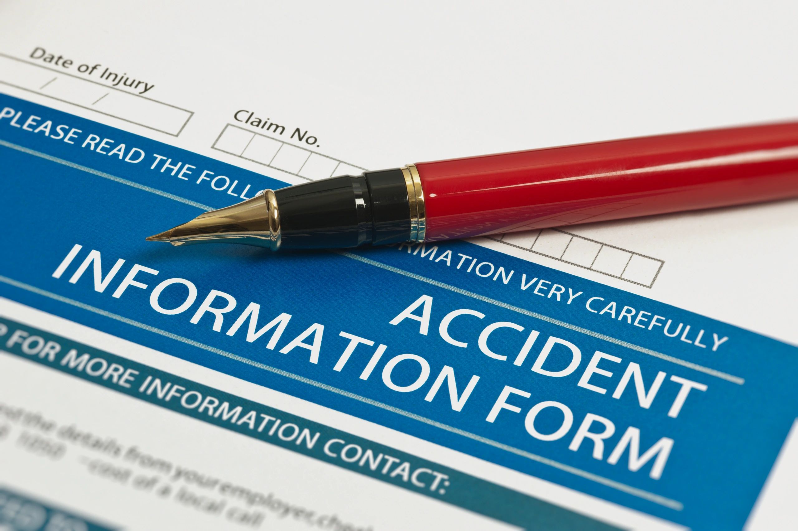Accident information form on clipboard
