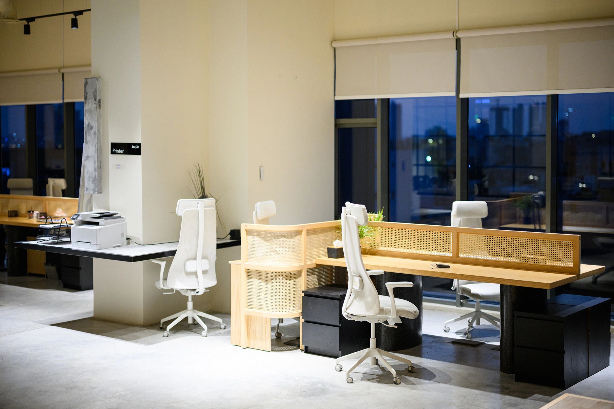 Modern office interior with desks and chairs